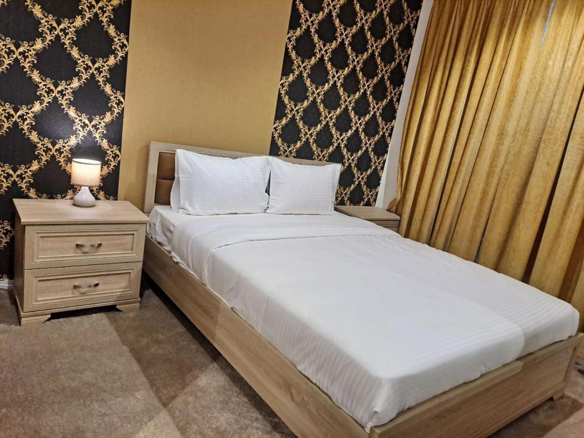 Golden Dahlia Fintas Aparthotel Kuwait City Exterior photo